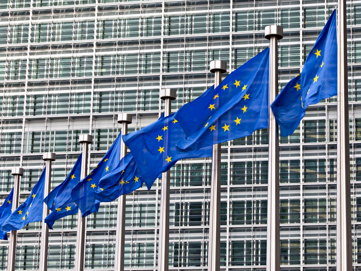 European Union Flags Against Building