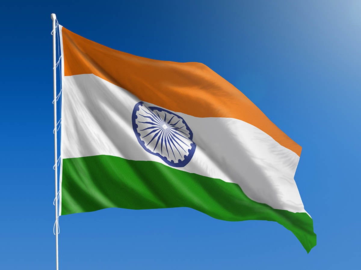 Flag of India against blue sky 