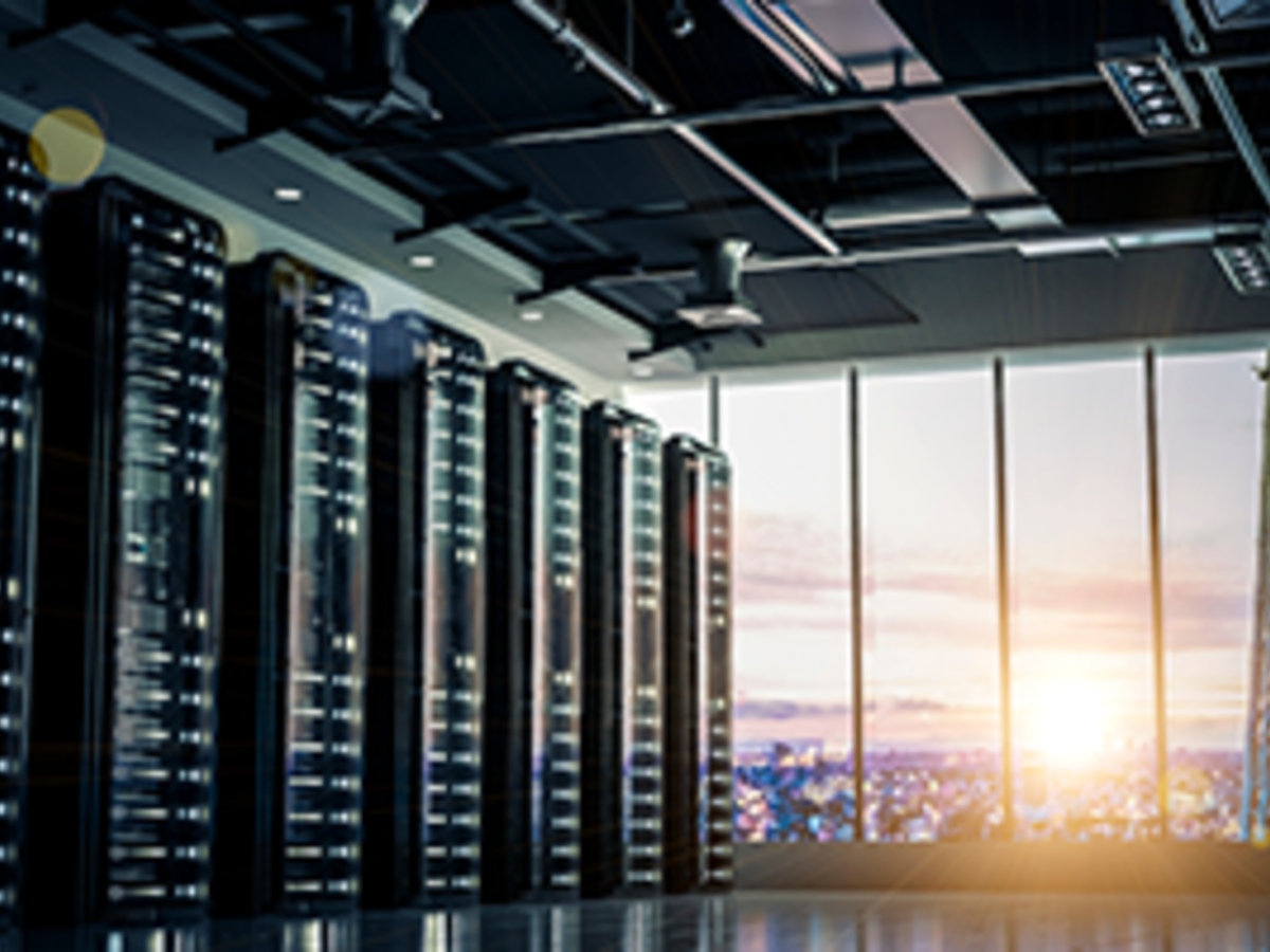 Close up of a data center with the sun in the background.