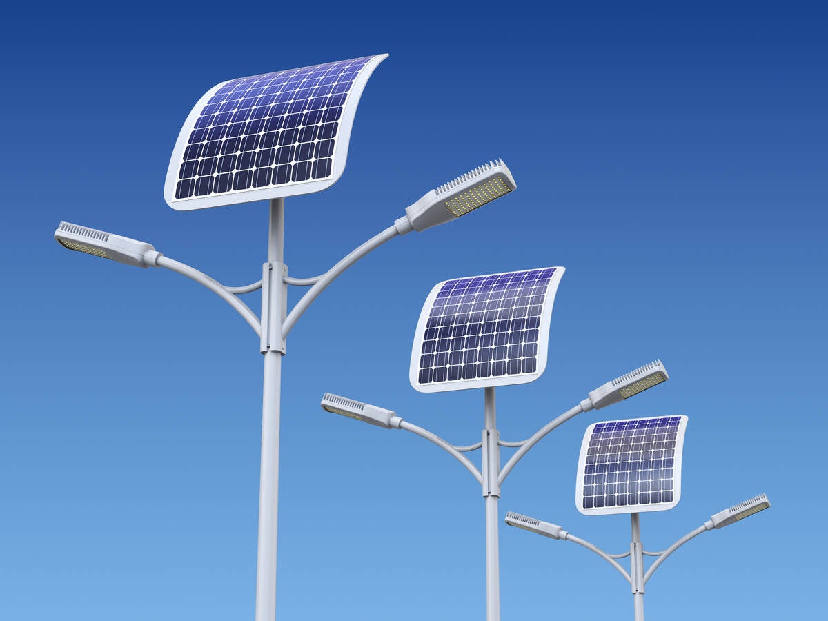 solar-powered streetlights shown in the daylight with blue sky background