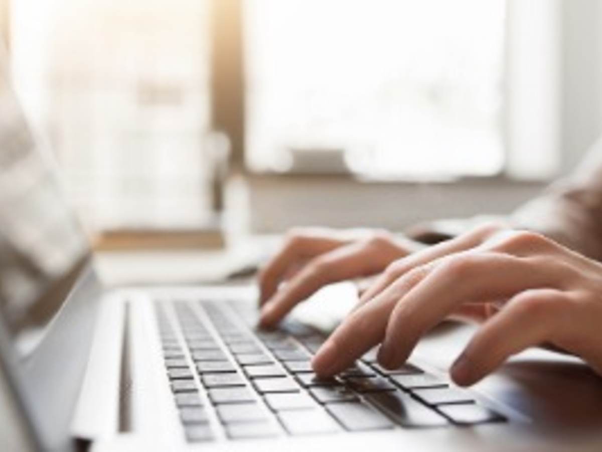 typing on laptop