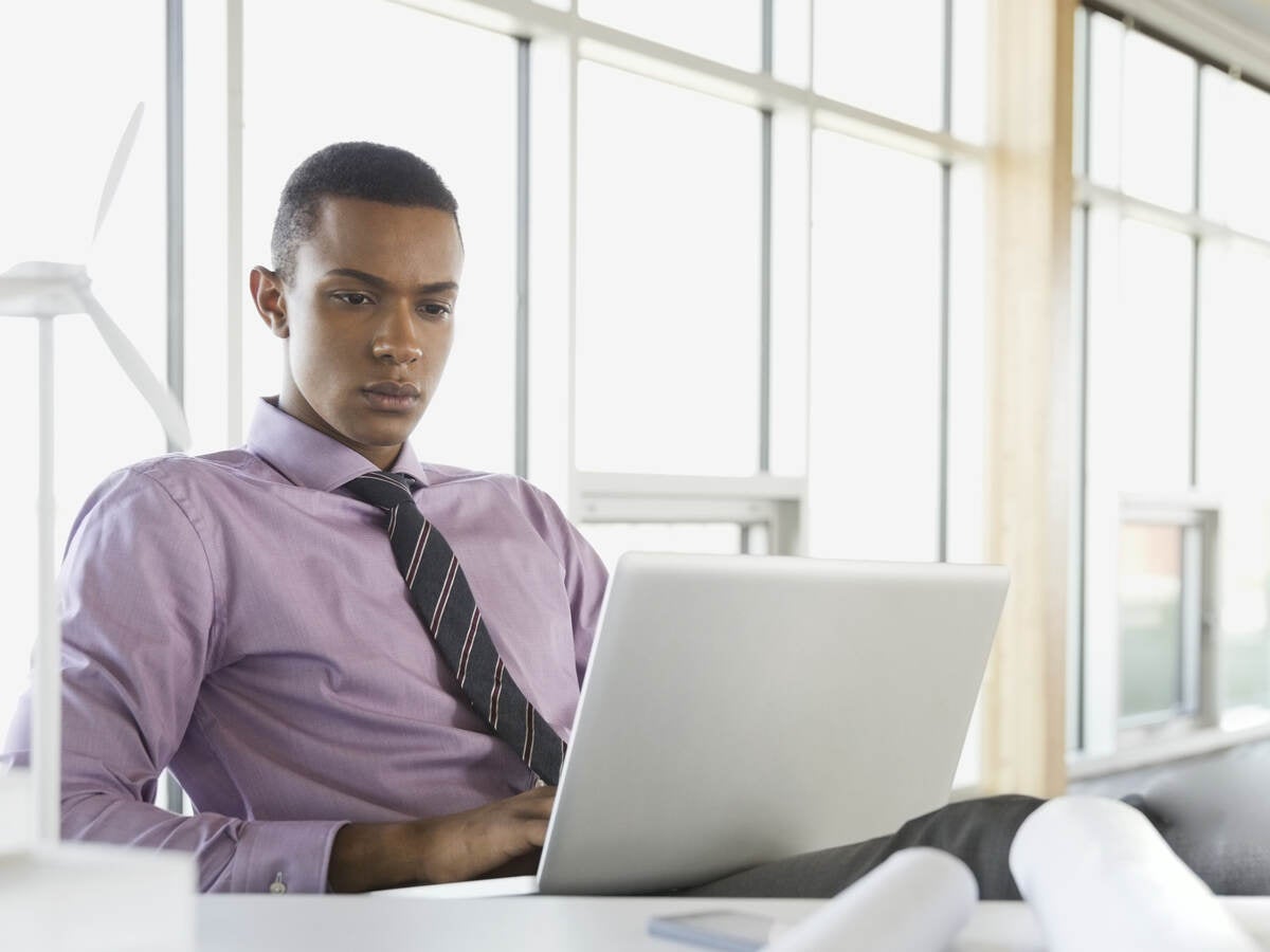 man working on laptop