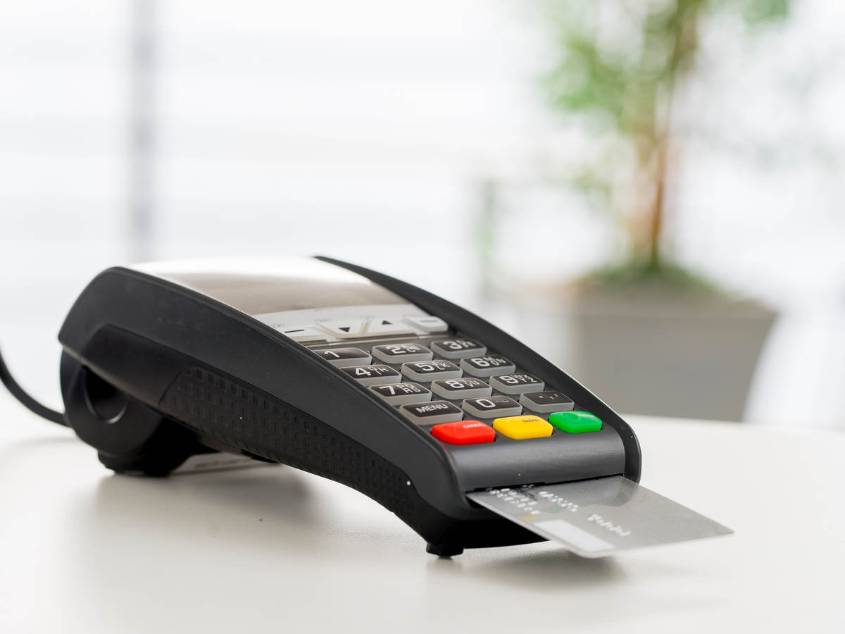 chip-enabled credit card in a card payment reader terminal
