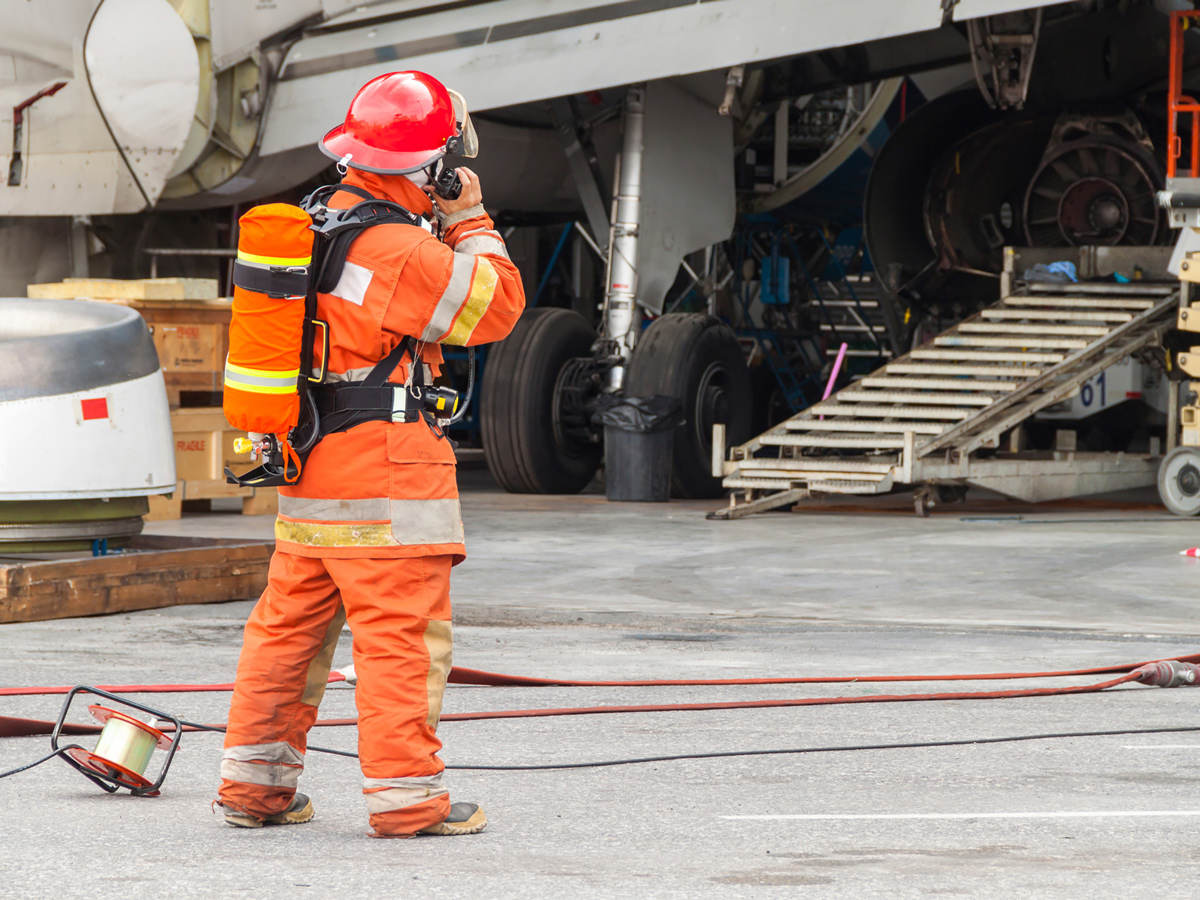 Firefighter communicating on radio