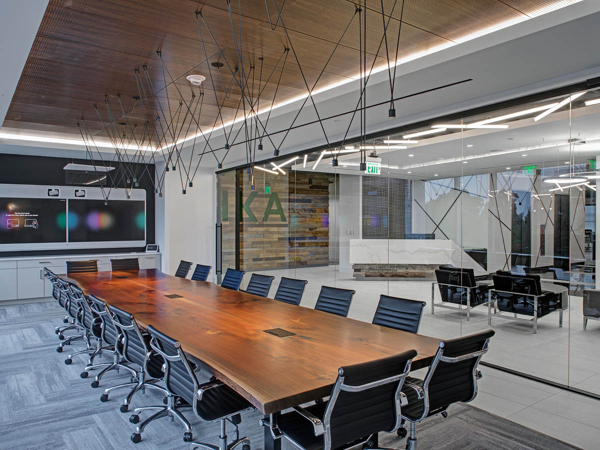 A conference table in a light-filled room