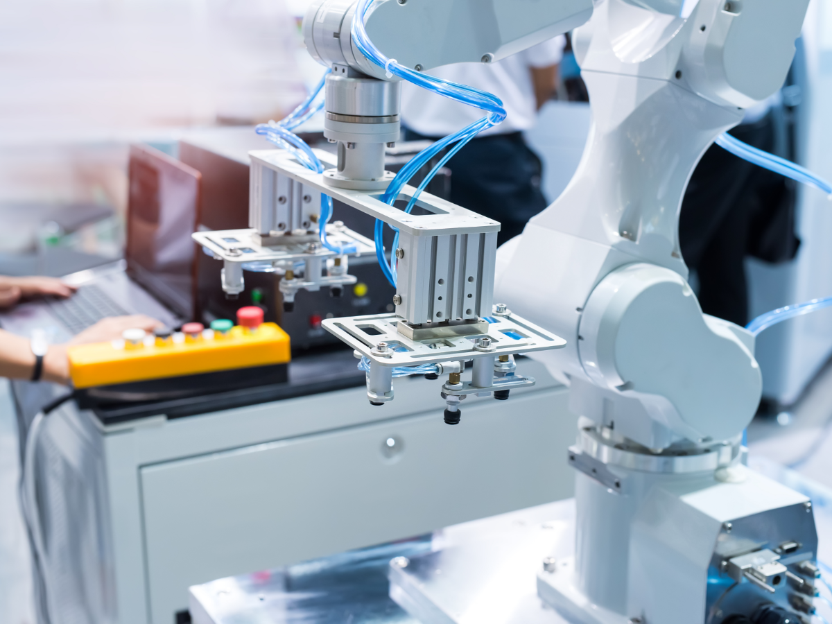 Industrial robot with conveyor in factory
