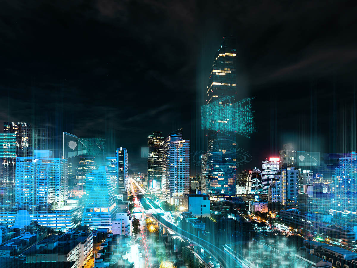 Modern city illuminated at night