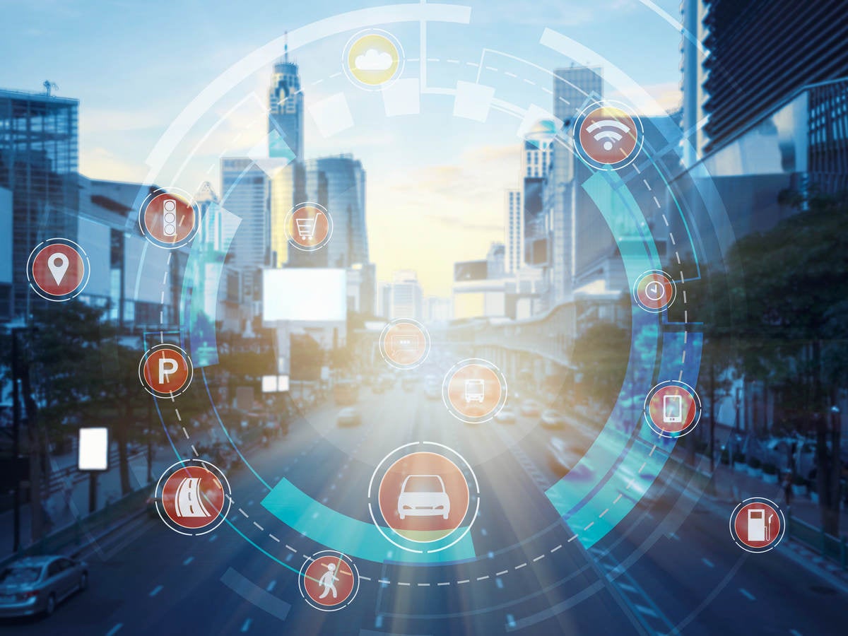 City street scene with technology icons in circular formation