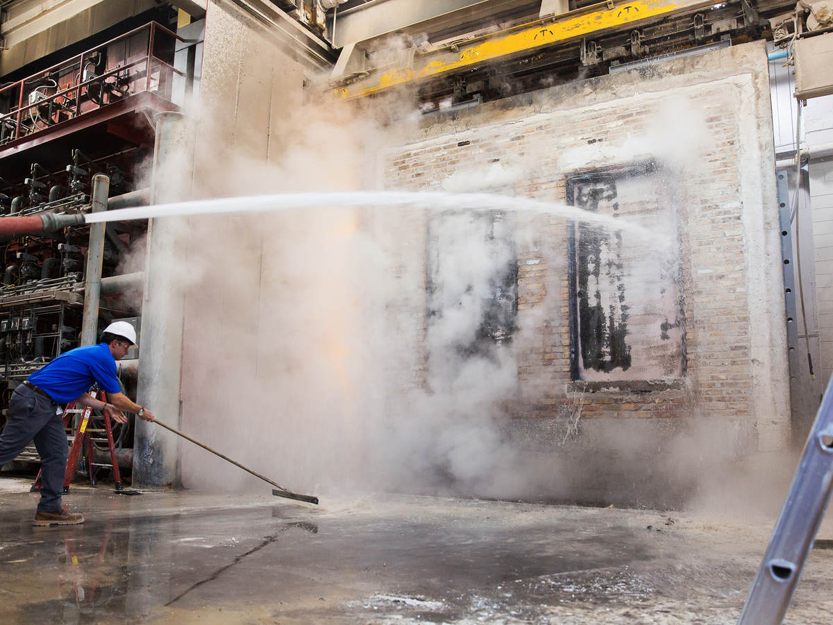Hose stream testing for impact on fire door