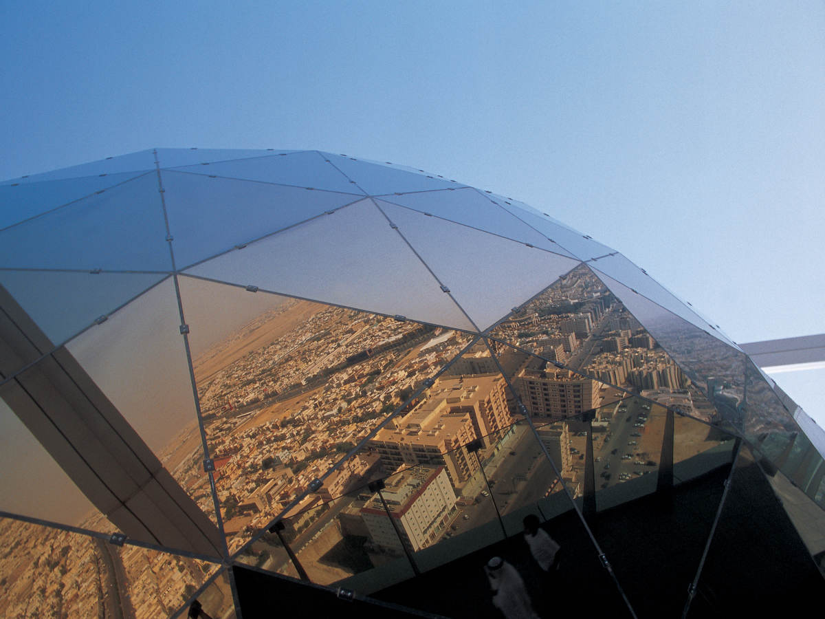 Glass prism reflecting city of Saudi Arabia