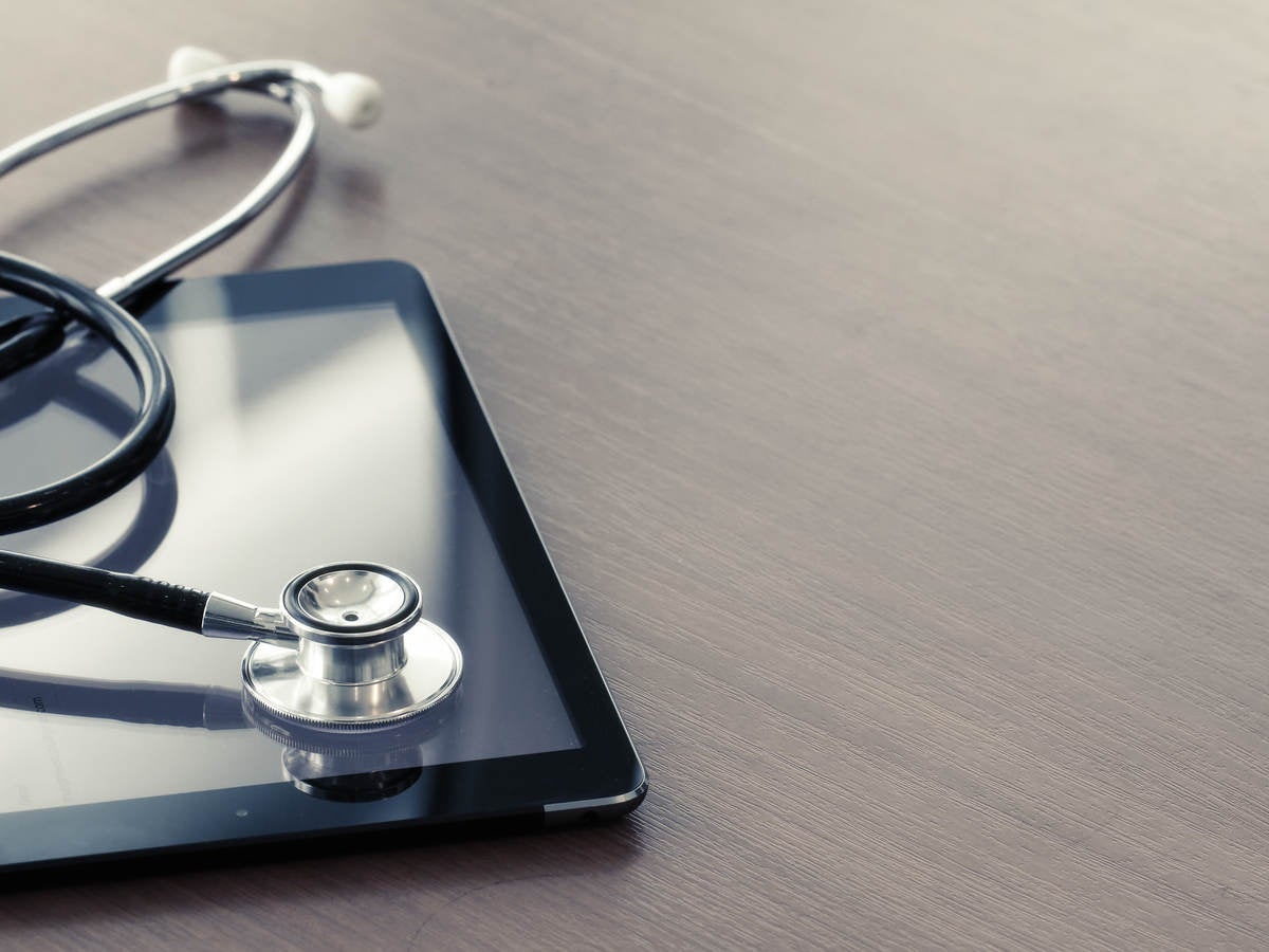 Stethoscope placed on a tablet 