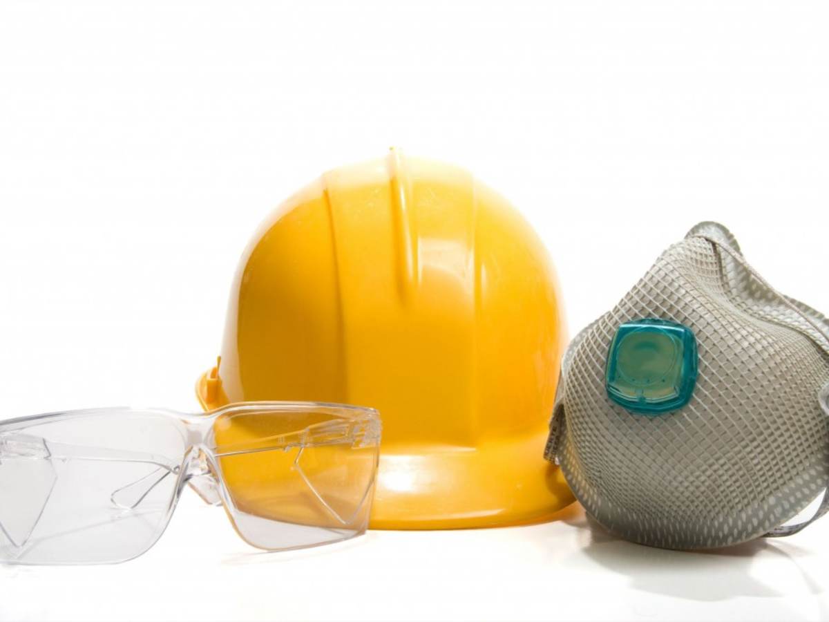 Picture of protective glasses, hardhat, and face mask