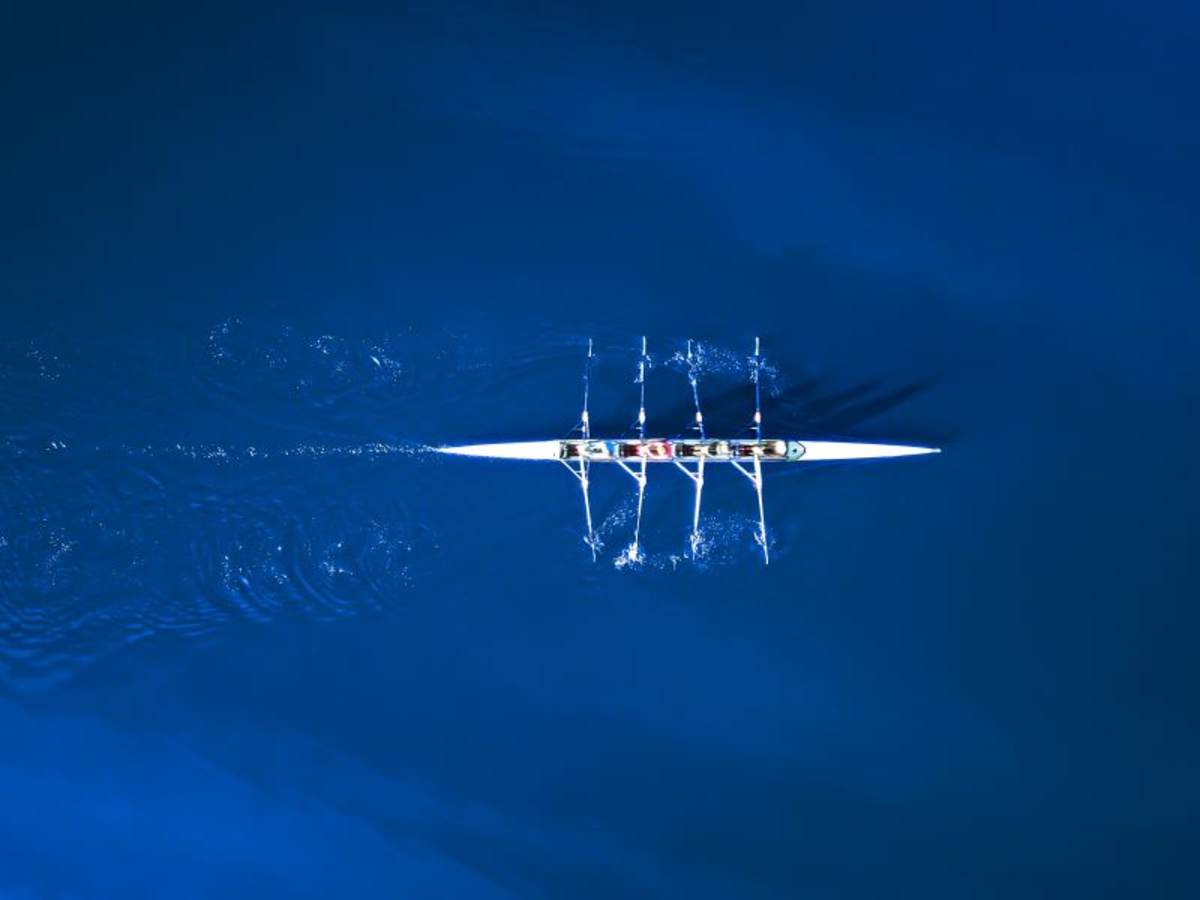 rowing team on river