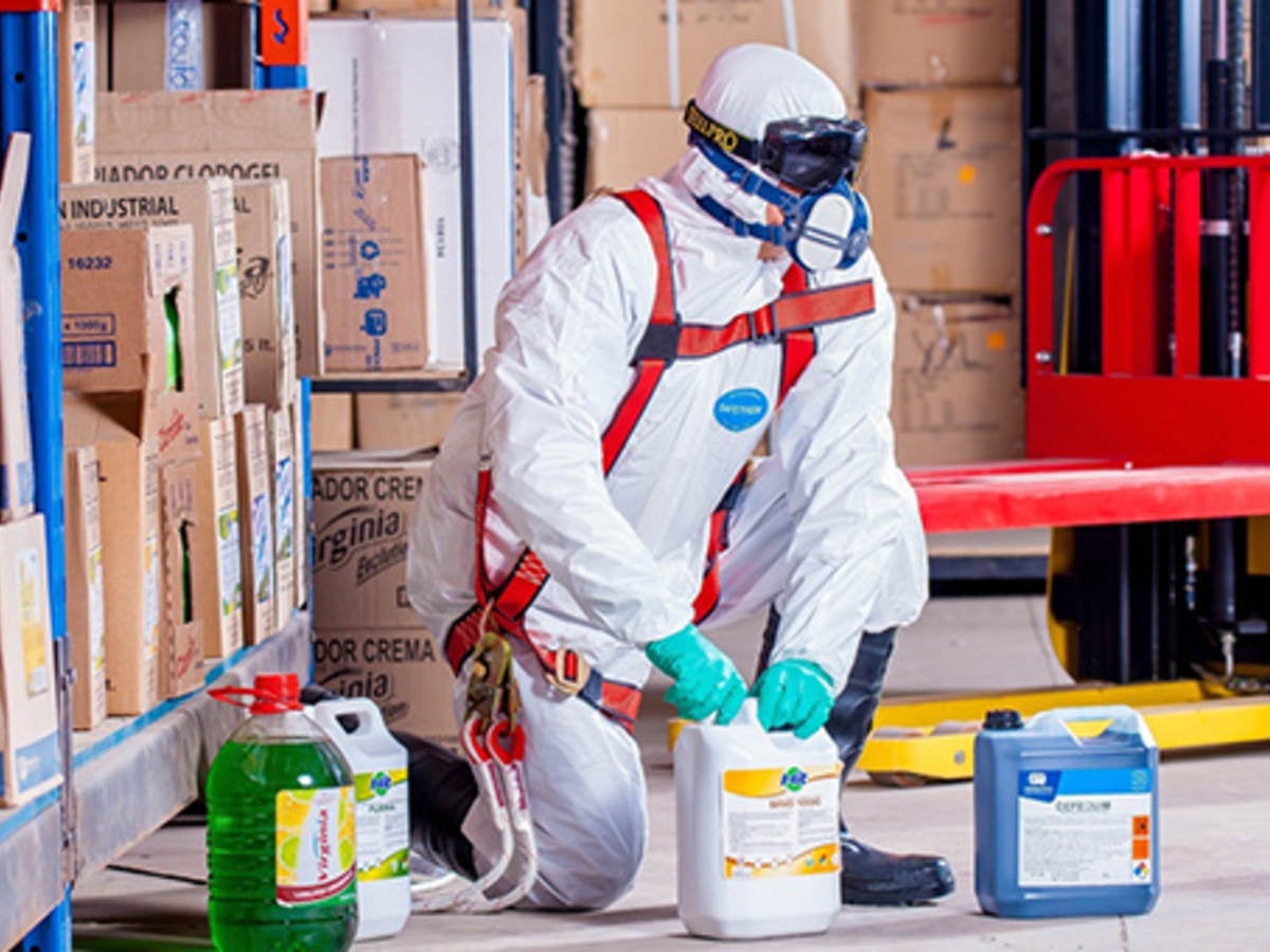 Man in White hazmat suit 