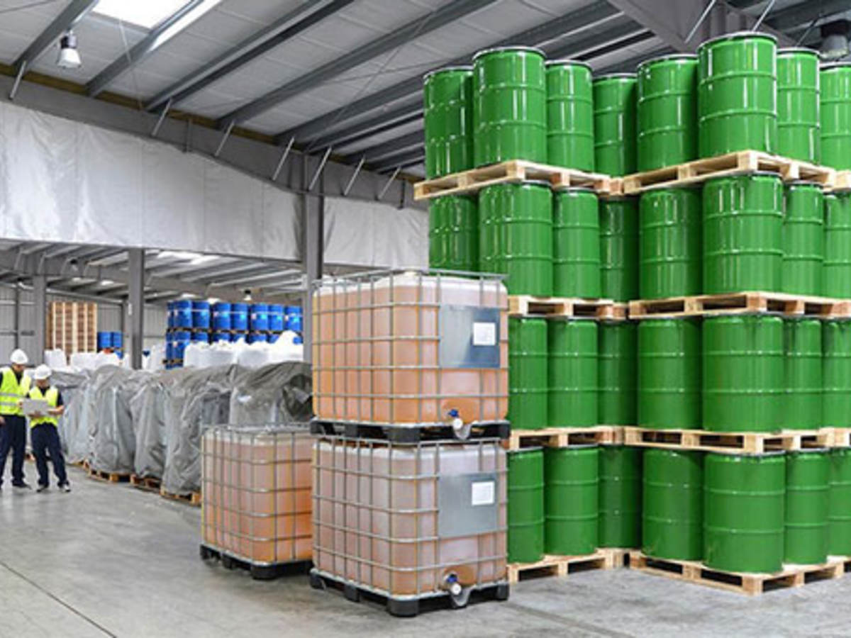 Warehouse with green barrels  