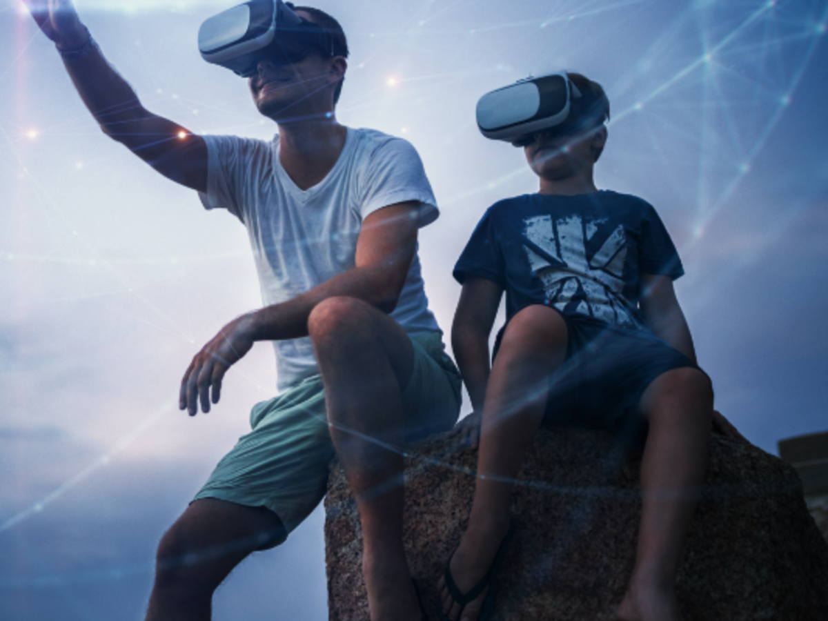Two boys using VR devices