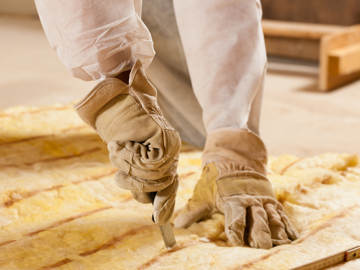 Cutting stuffing for furniture.