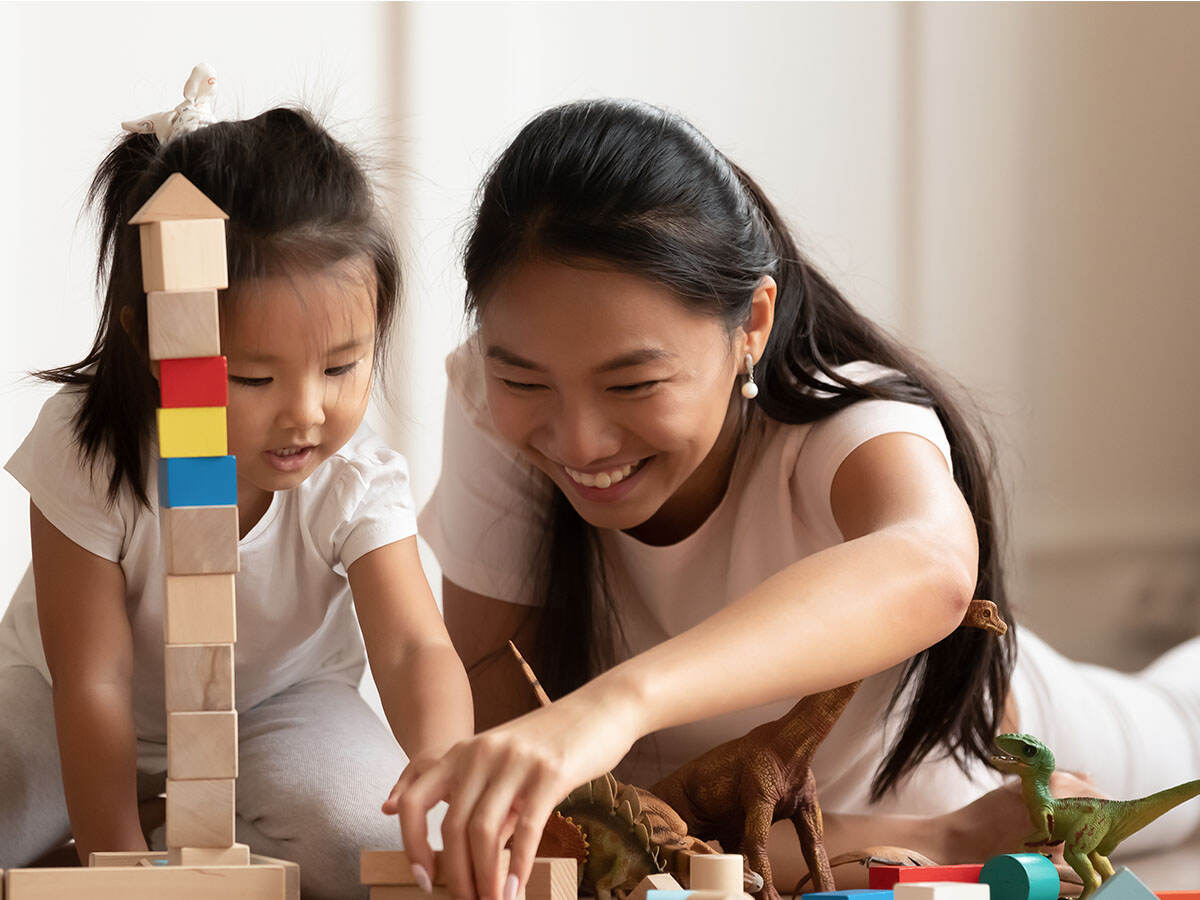 Mom and child playing with toys