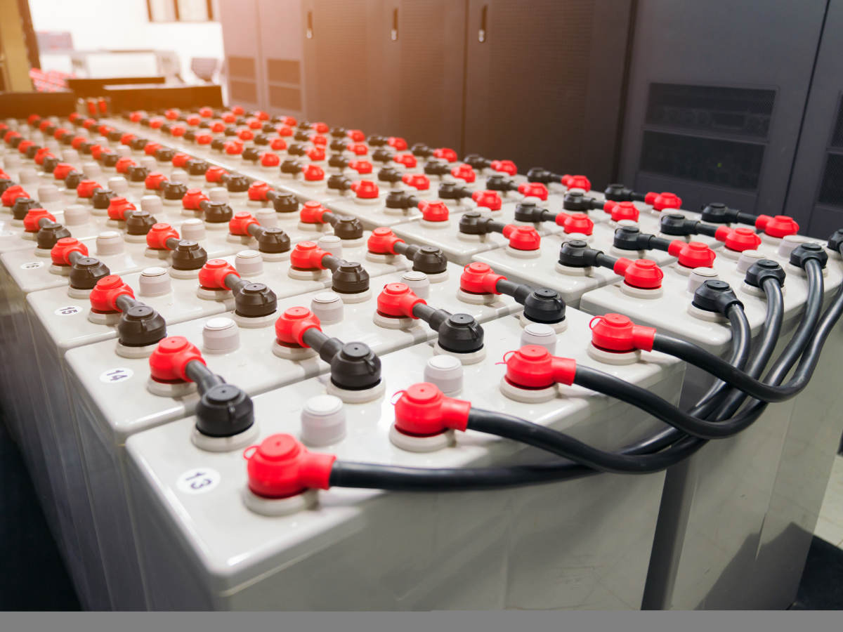 Rows of battery packs in industrial backup power system