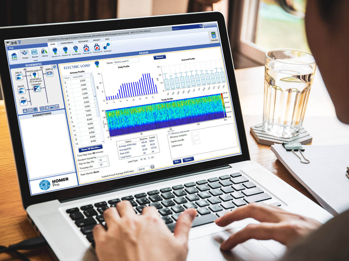 Person using HOMER Pro microgrid software on a laptop