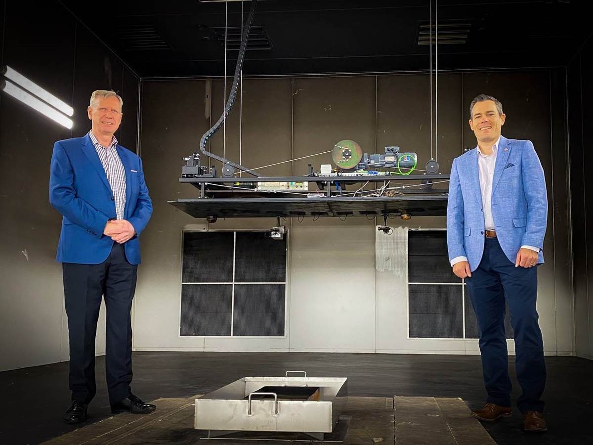 Mark Burgess, director, Infrastructure Technologies and Testing Services, Commonwealth Scientific and Industrial Research Organisation, left, and Matthew Wright, built environment manager for UL in Australasia,right, pose inside a CSIRO test chamber.