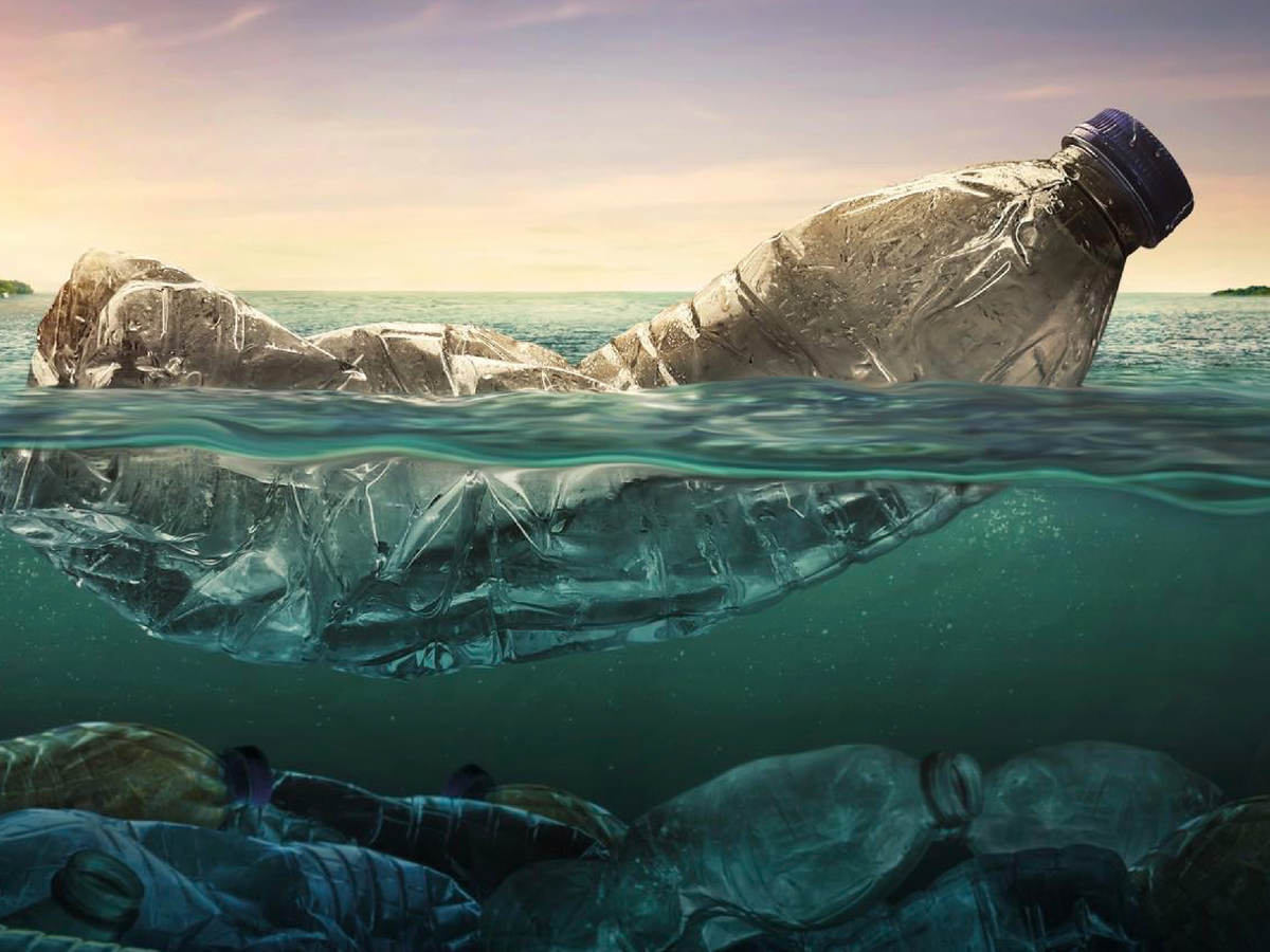 Plastic bottle floating in ocean