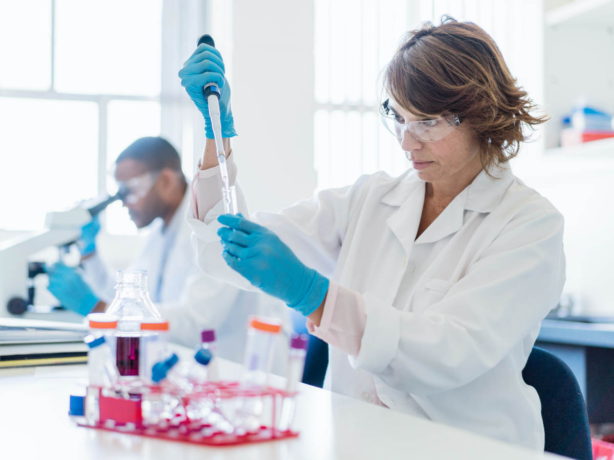 Chemist working on chemicals