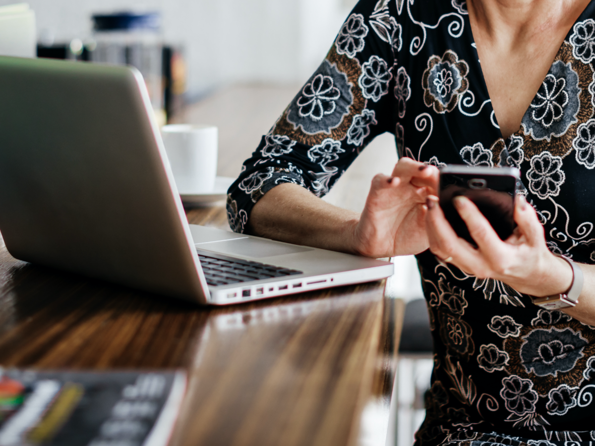 woman looking at a mobile phone