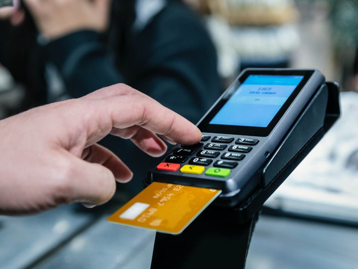 man using a payment terminal