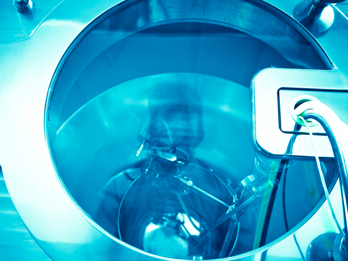 A close up view of a piece of industrial equipment using UV sterilization.
