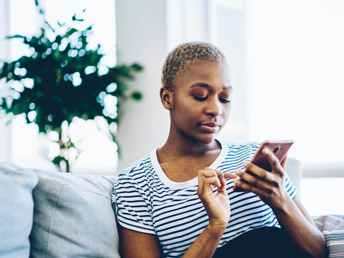 woman looking at a mobile phone