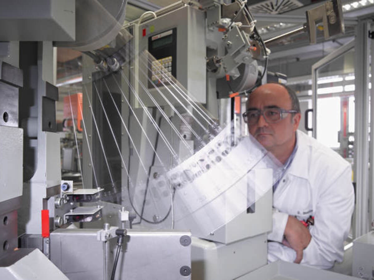Lab tech conducting impact test