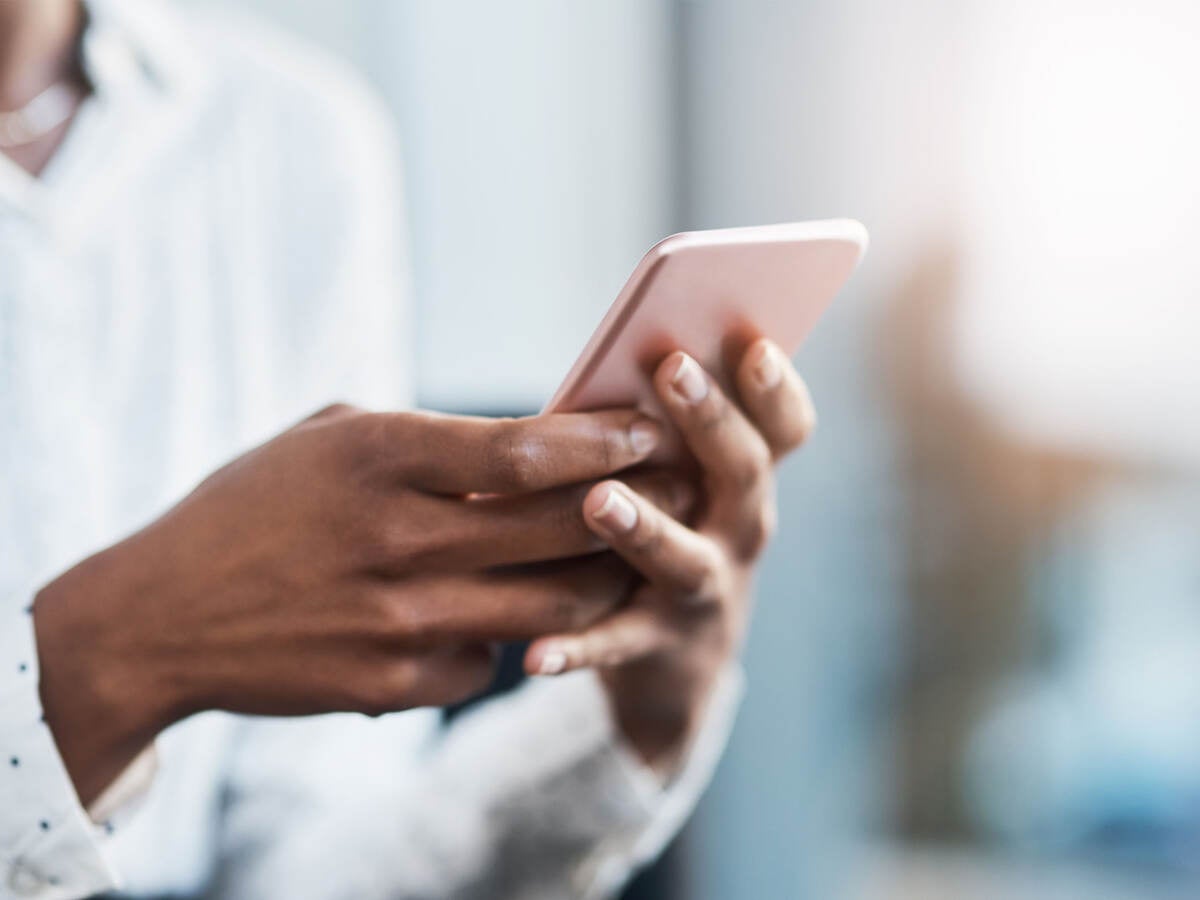 A businessperson using a mobile phone