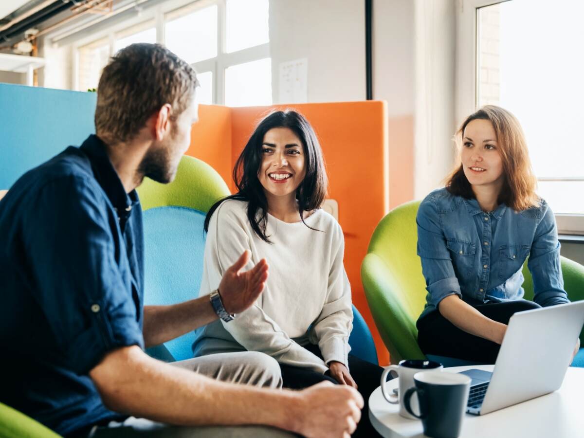 People talking in an open air meeting environment