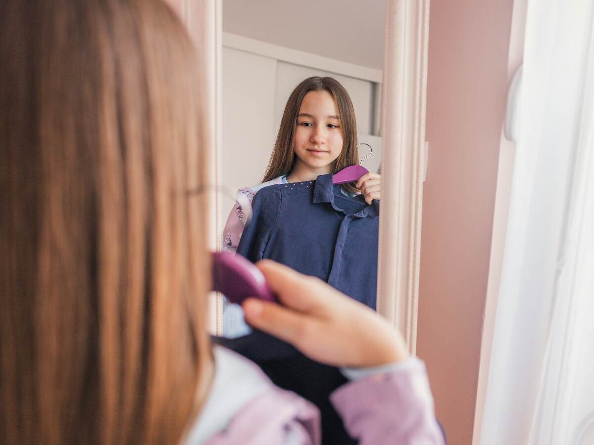 Girl chooses a dress