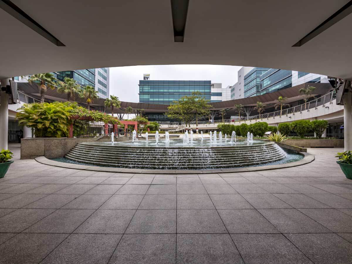 View of fountains from an exterior location with an overhang