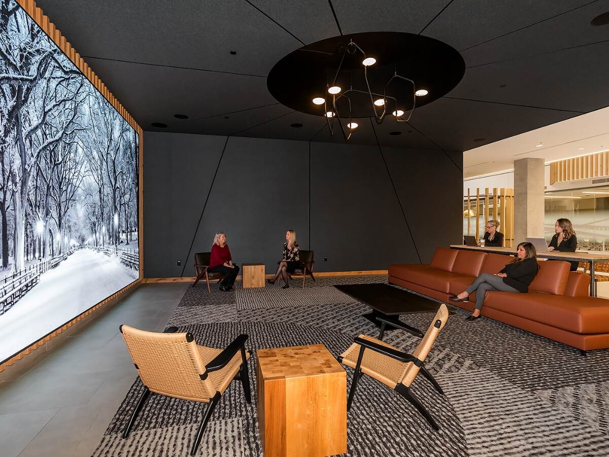 Office workers seated in a common area