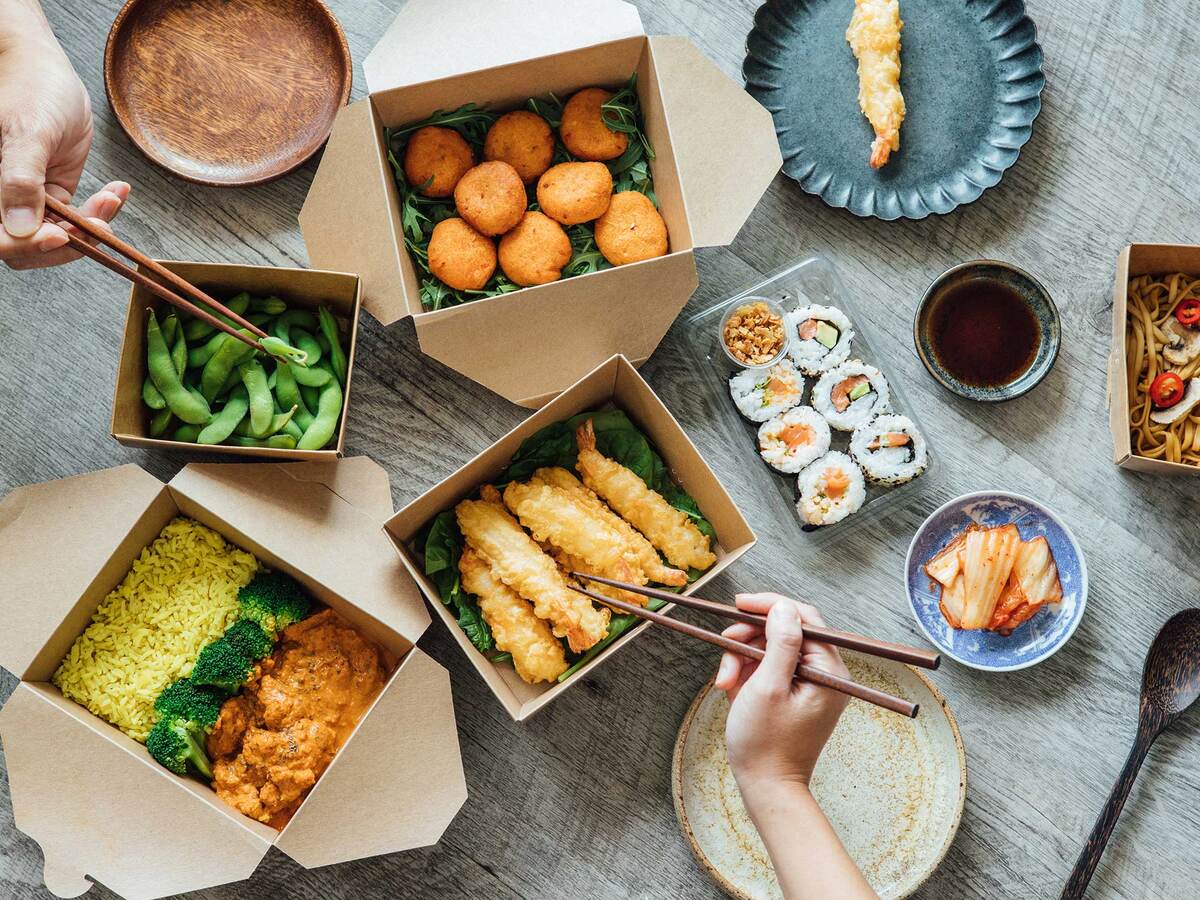 People sharing takeout food