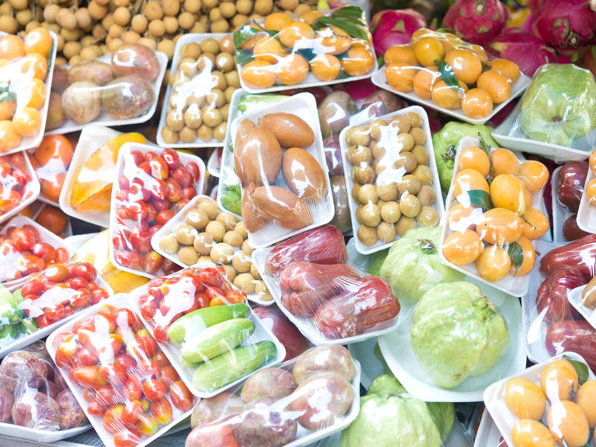 assorted wrapped packages of various fruits and vegetables