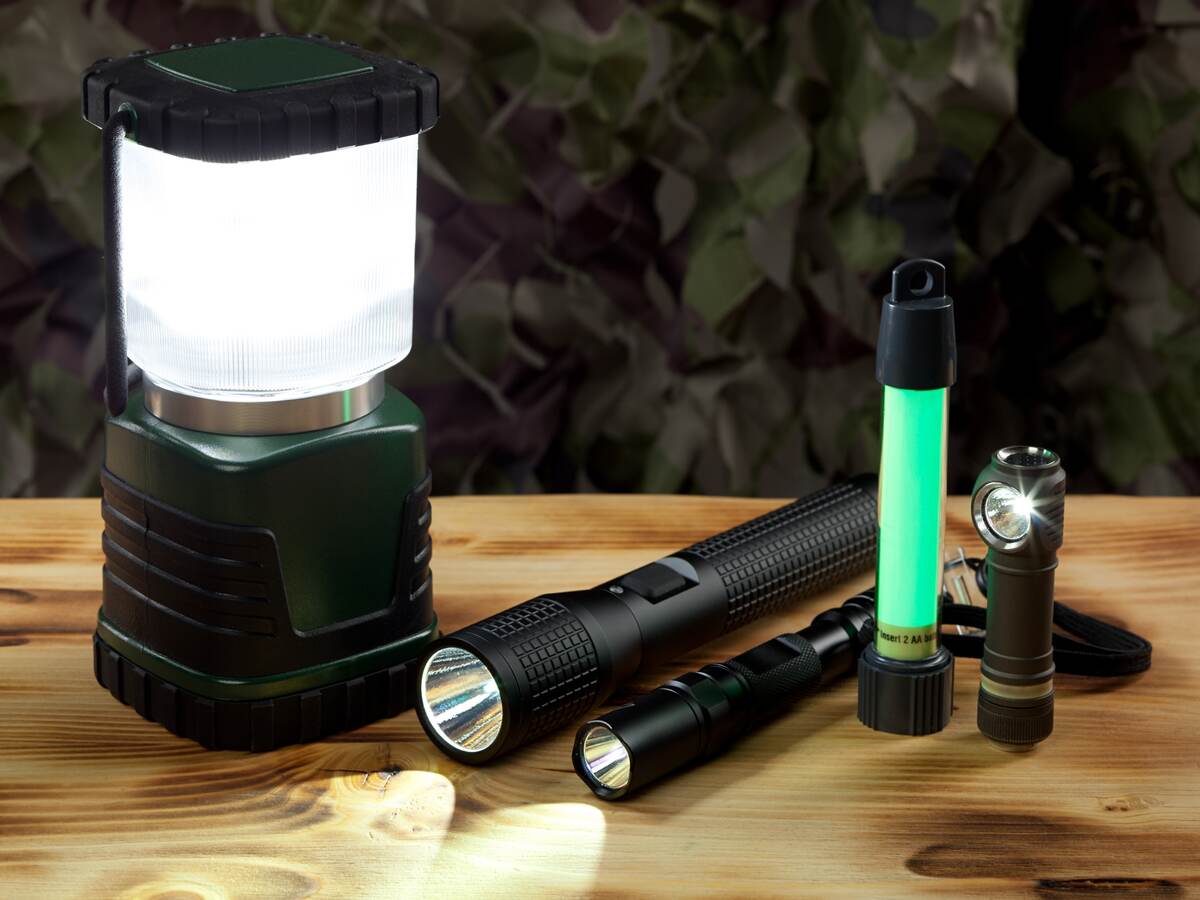 An assortment of portable luminaires and flashlights.