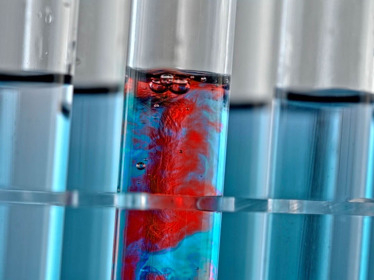 Close-up of test tube with blue liquid