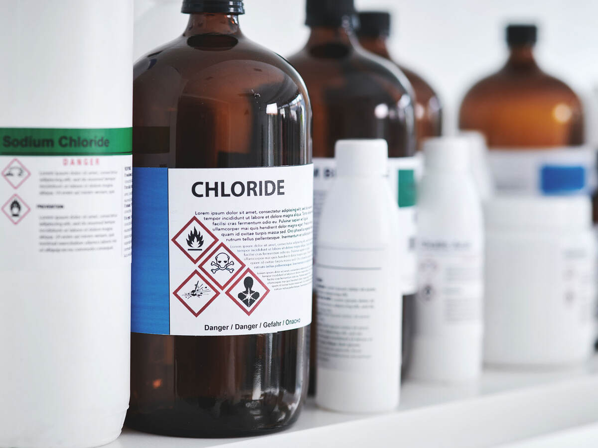 common lab chemicals - bottles of chemicals on a shelf in a lab