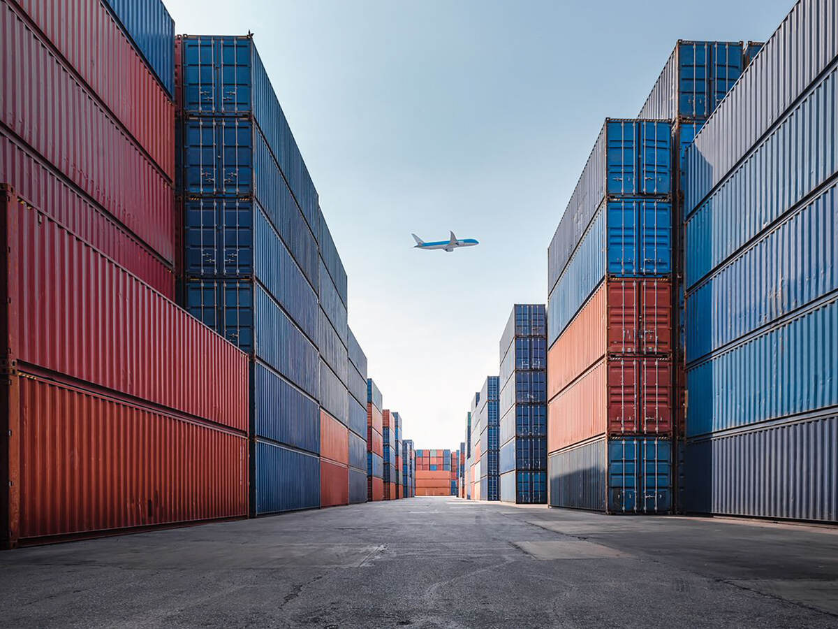 storage containers with airplane overhead