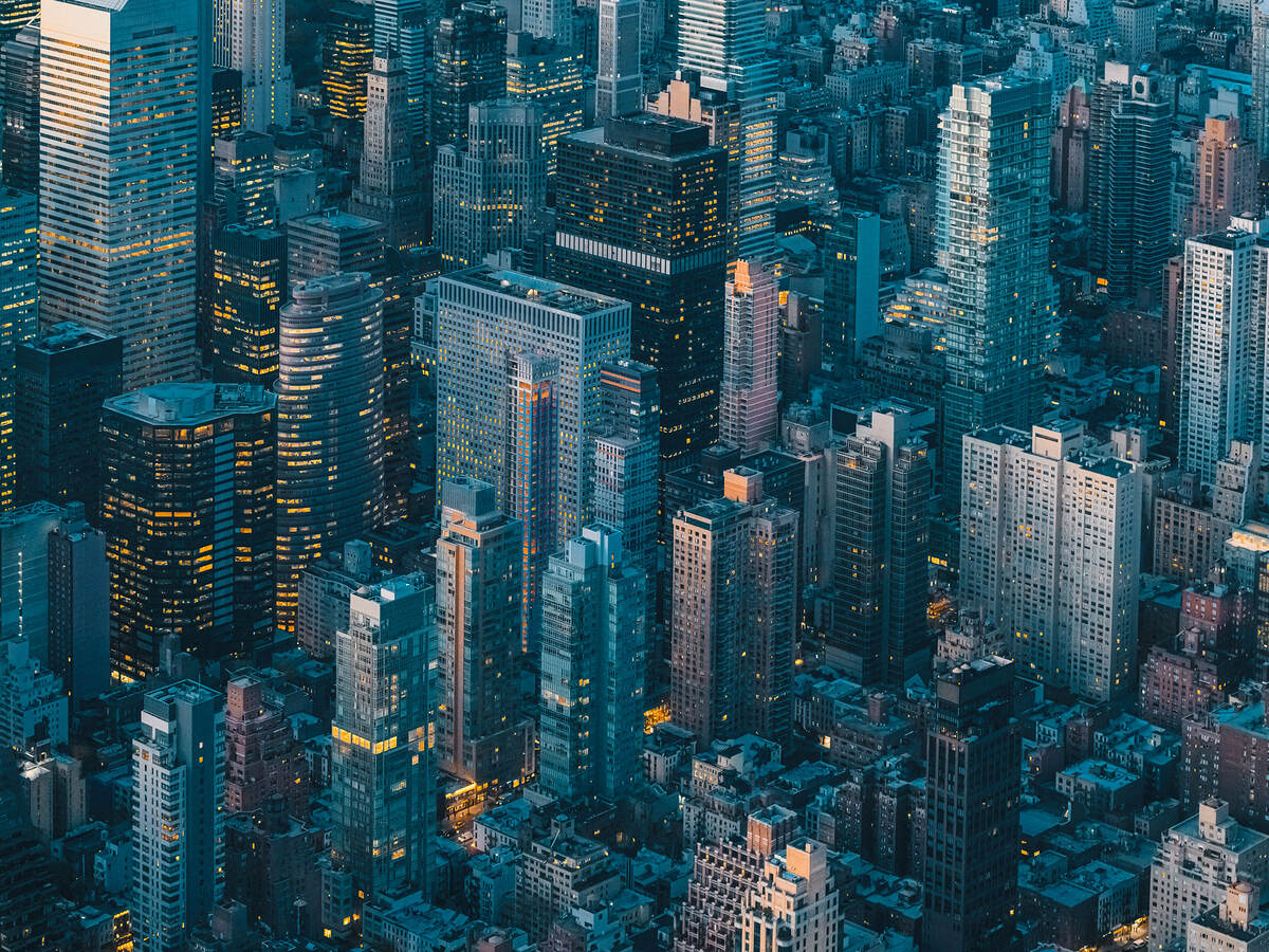 an aerial view of a city at night