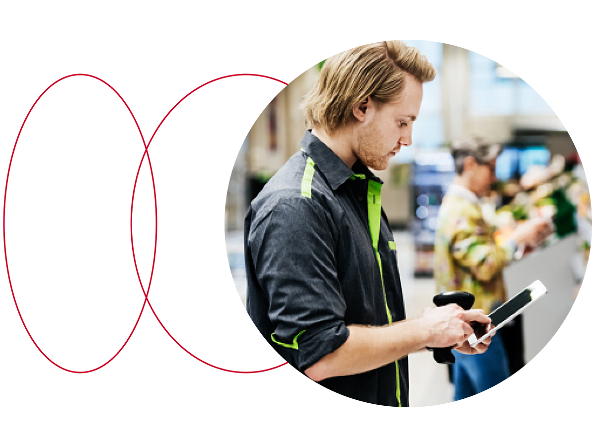 Customer using mobile device while shopping