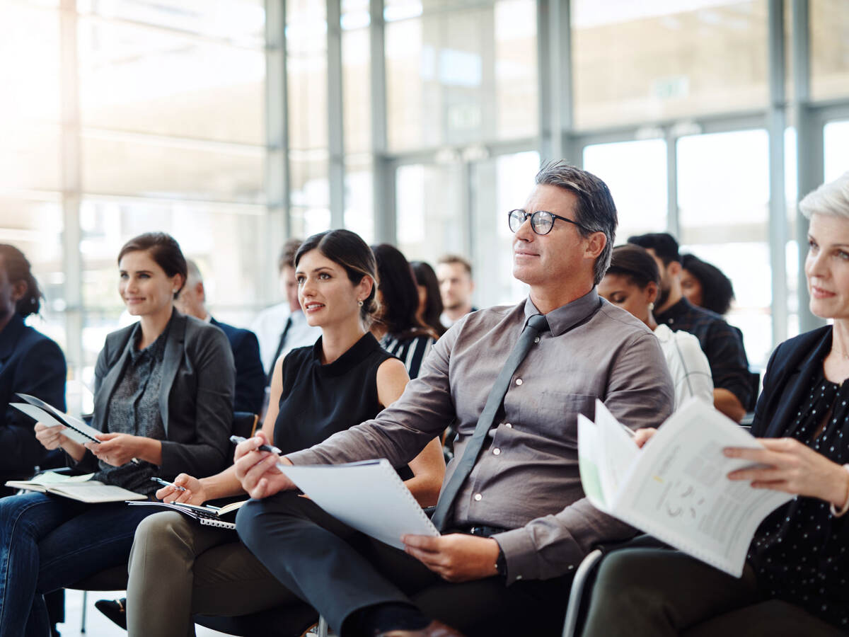 A group of businesspeople attending a conference