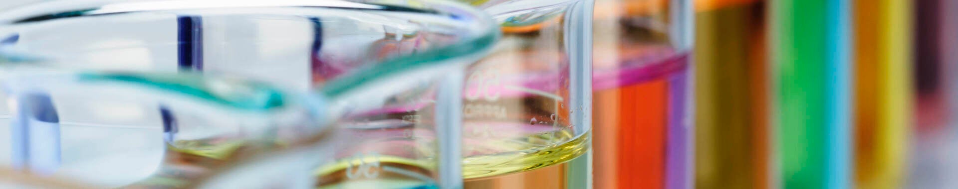 Beakers with solutions of transition metal salts