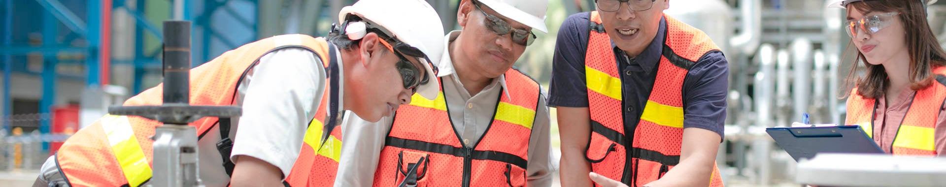 Safety personnel conducting equipment inspection