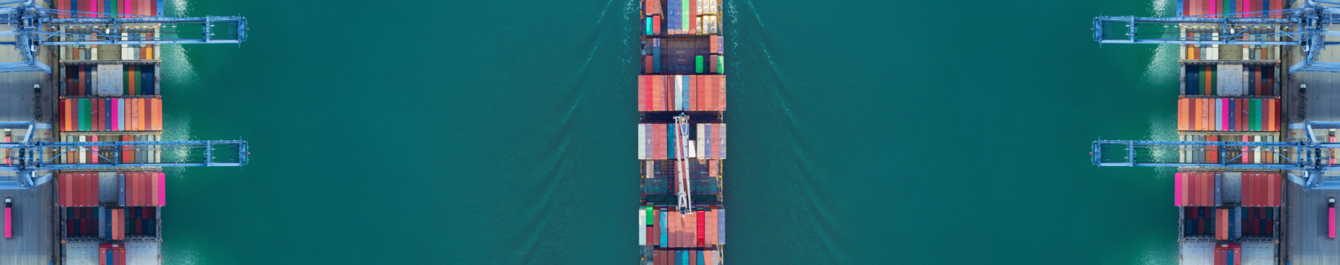 Container ship crossing a river