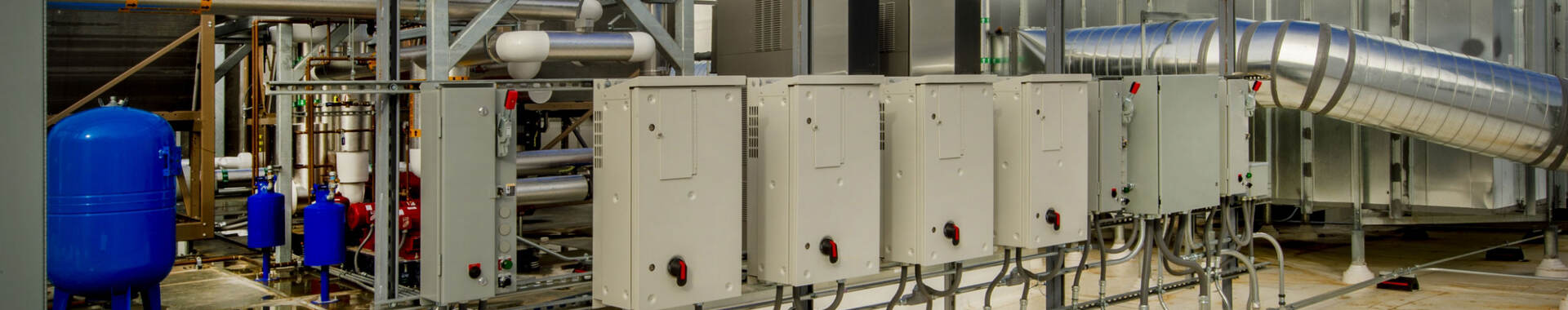 Industrial control panels on roof with covers
